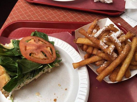 Sandwiches were huge (this is half), funnel cake fries were novel & picked up a chocolate covered cheesecake slice for the road.