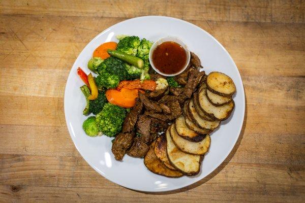 Cajun Spiced Steak with Sliced Potatoes, Mixed Veggies and a Chili Apricot Glaze