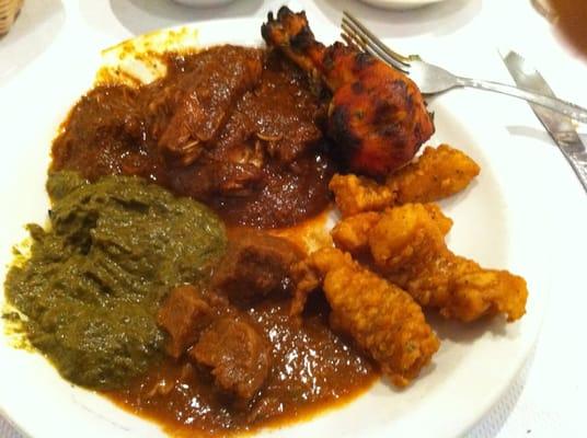 Clockwise: Tandoori chicken leg, Fish Pakora, Lamb Vindaloo, Saag, Chicken Vindaloo