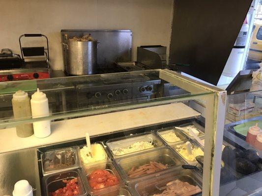 There is also a food prep area (not just ice cream & popsicles). Check out the boiling chicken in the background.