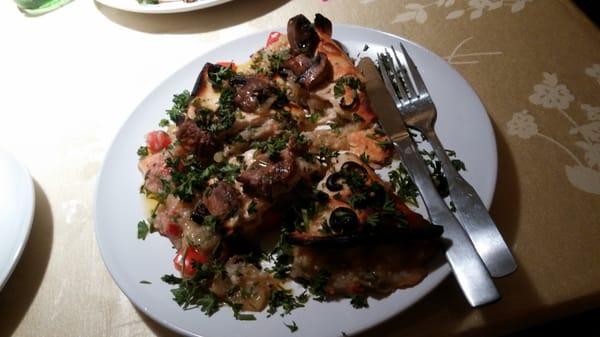 New dish -- the baba bake, like a stromboli or stuffed Syrian pizza, with mushrooms on top and babaganoush baked inside.