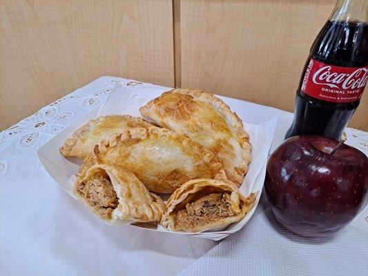 Chicken empanada with apple and coca cola