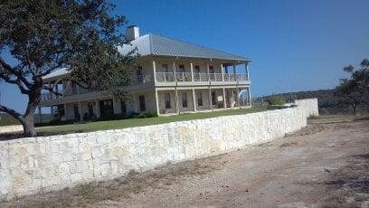 Limestone block retaining wall built for Sen. Phil Gramm's Country Estate.