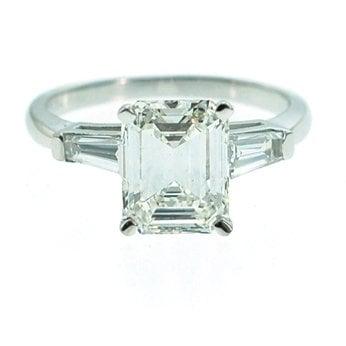 Platinum Emerald Cut diamond ring with Baguettes