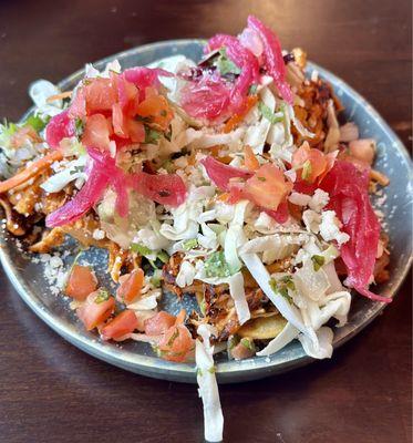 Mini Chicken Tinga tostada.