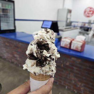 Vanilla with ore cookies with a sugar cone