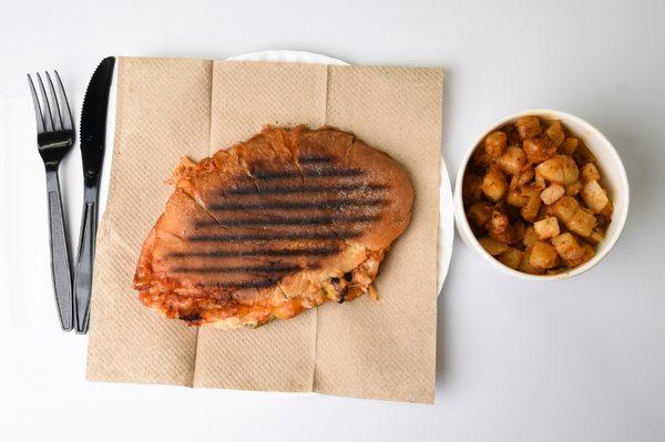 Spreads Panini with a side of Hash browns