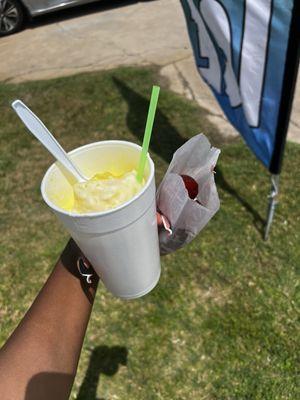 small banana snowcone with sweet cream and koolaid pickles