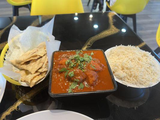 Butter naan and goat vindaloo