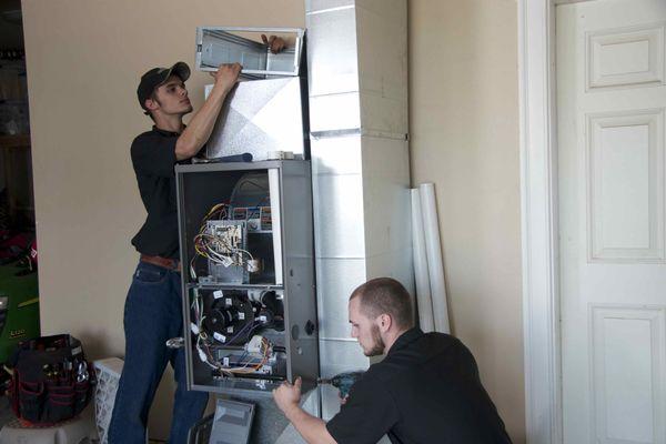 Furnace and air filter cabinet installation.