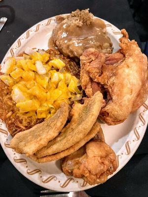 Surf n turf: perch, broasted chicken, stuffing, crispy hash browns with cheese and onions.