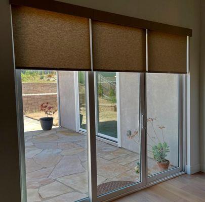 This customer wanted roller shades to add a different look for their sliding glass door without sacrificing functionality.