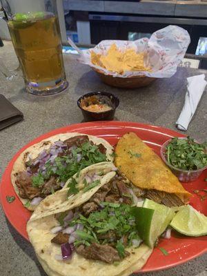 Birria, steak and carnitas taco