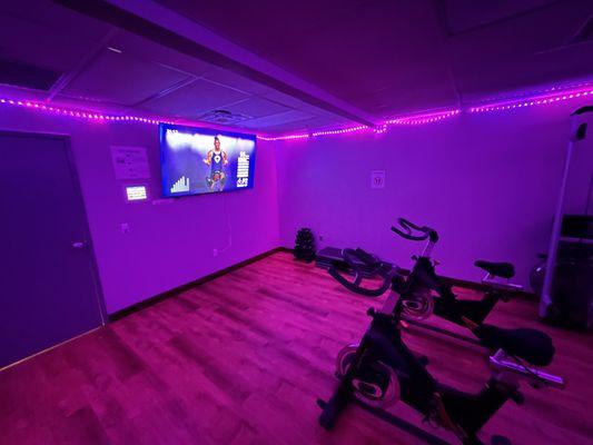 Fitness On Demand room. Over 700 classes of categories including yoga, cycling, HIIT, kick boxing, etc.