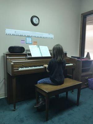 One of the students playing piano.