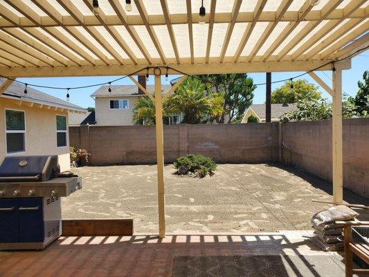 Freshly leveled and compacted backyard. Ready for some pavers!