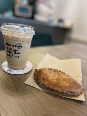 Veggie Samosa empanada and a black seeded honey latte