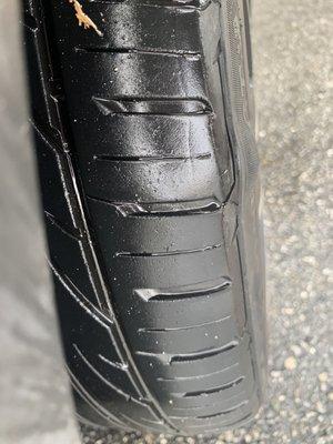 Another deep scratch and bump on passenger side of tire