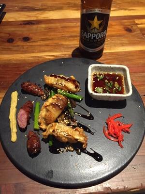 Kurobuta Pork Sausage + Gyoza. This small plate was a great starter before the Tonkatsu Ramen. Both great choices, filled with flavor!