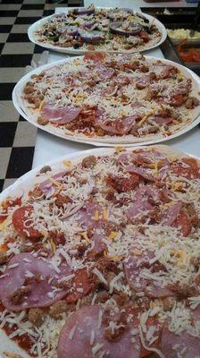 Try one of our delish take n bake pizzas!