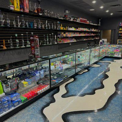 Here's a quick corner shot of our store. You'll see Bongs, kratom, vapes, and everything else you may need at your local smoke shop.