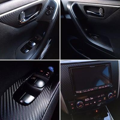 Custom black carbon fiber wrapped interior in a 2014 Nissan Altima