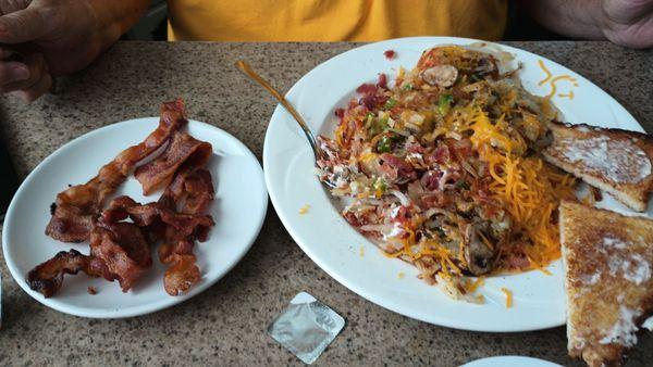 Side of bacon  Stuffed hash browns and gluten free toast.