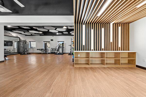 Brand New Fitness center with free weights, cardio and TRX equipment.