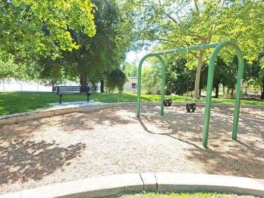 Swings and benches at Breen Park