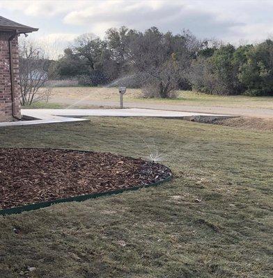 Irrigation install, new sod and flowerbeds