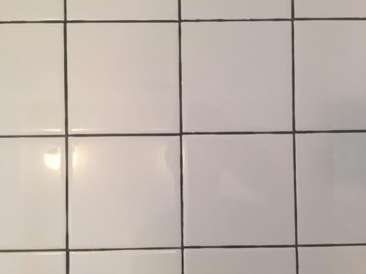 Shower wall. Tiles throughout do not line up.