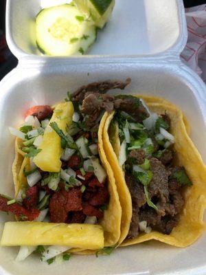 Delicious tacos! Al pastor on the left and asada on the right