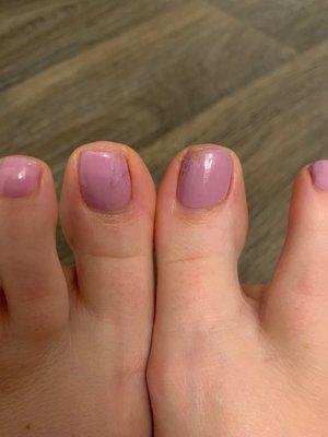 Smudged toe polish