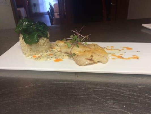 Pan seared flounder with Parmesan couscous, sauteed Swiss chard and whole grain mustard burr blanc.