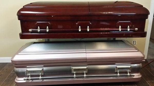 Beautiful Metal and Solid Wood Caskets at our showroom