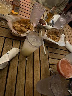 Chips and salsa, lemonade (good but very sweet), strawberry margarita (right), grand plata margarita (left and strong but good).