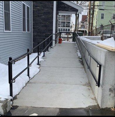 Exterior handicap railings. Lawrence, Ma