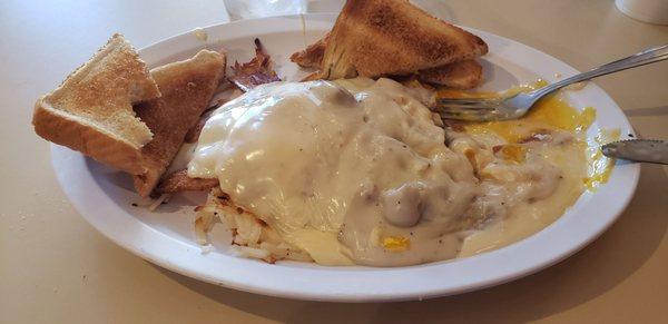 Horseshoe breakfast.  Eggs cheese hashbrowns gravy and bacon goodness