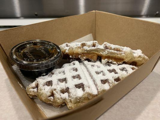 Croffle with powdered sugar and maple syrup (Croissant Waffle)