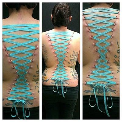 back corset piercing by Chris