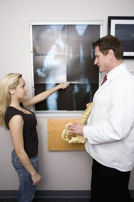 Dr. B showing patient her x-rays