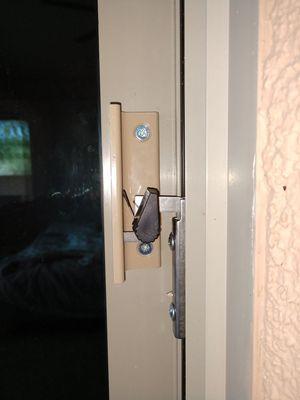 New style latch on a vinyl door