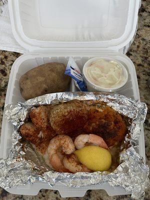 Large Seafood Combo, broiled with baked potato and coleslaw