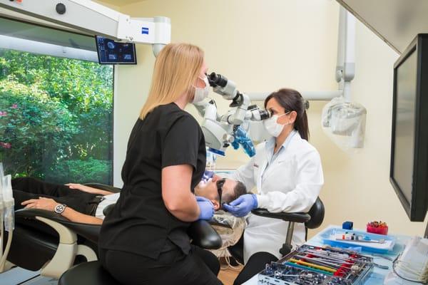 Dr. Loubna Pla and her assistant use a Zeiss PROergo Dental Microscope for the ultimate in precision care.