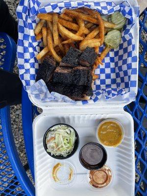 Burnt ends. If you are sharing the burnt ends, ask for an extra mustard sauce. That sauce is so delicious you won't want to share it!