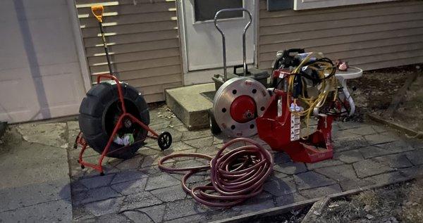 Drain cleaning equipment at work site.