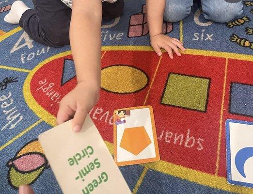 Circle time. Identifying shapes