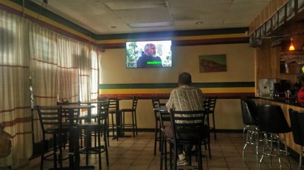 Dining area.with Ethiopian tv