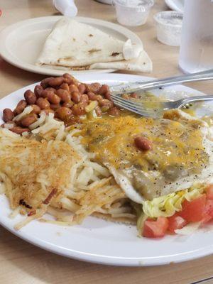 Juevos rancheros with beans & hashbrowns