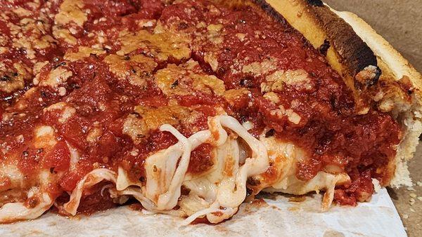 Cheese close up in a deep dish.